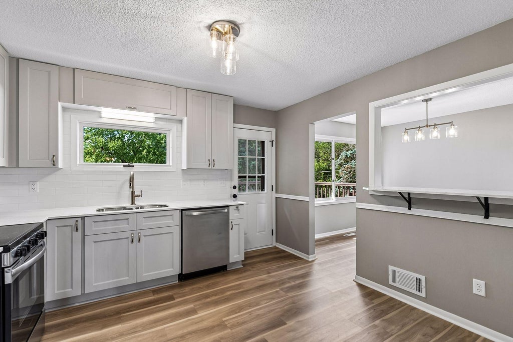 Photo of 963 Marnie Street S, Maplewood, MN 55119 (MLS # 7138904)