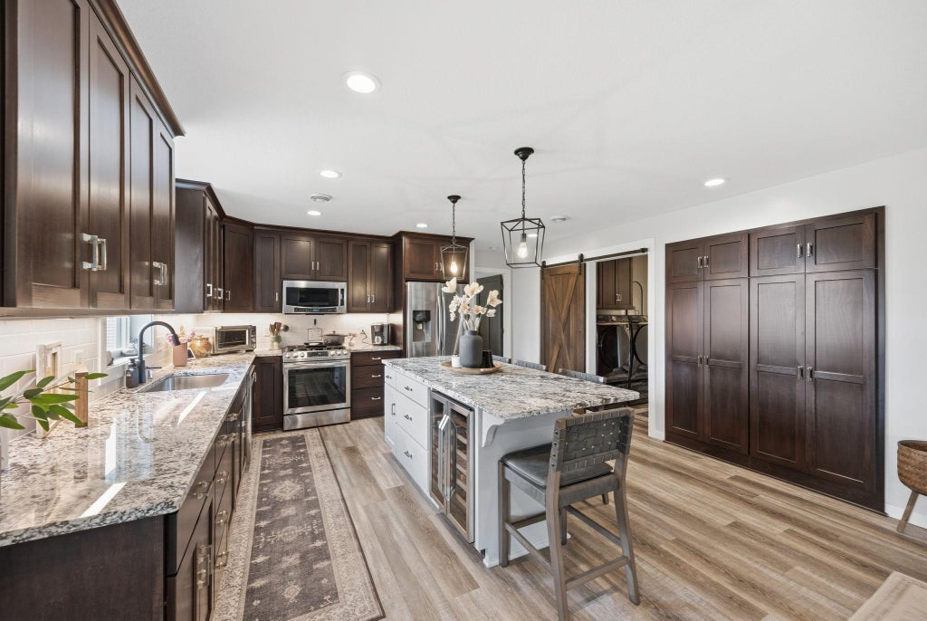 Photo of 126 Detroit Avenue SE, Hutchinson, MN 55350 (MLS # 7096710)