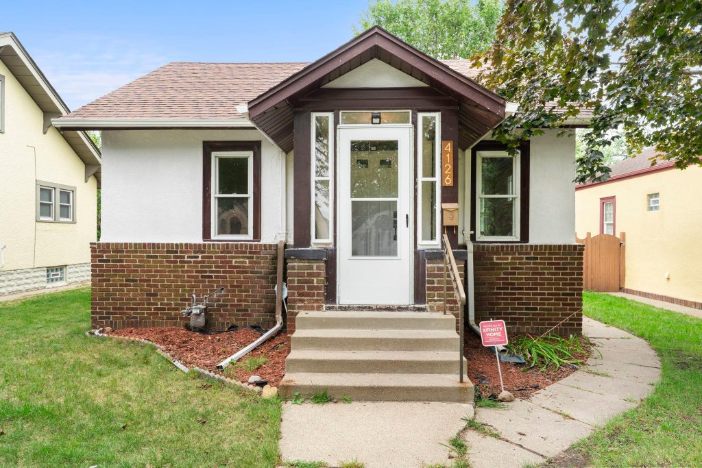 Photo of 4126 Sheridan Avenue N, Minneapolis, MN 55412 (MLS # 7149378)