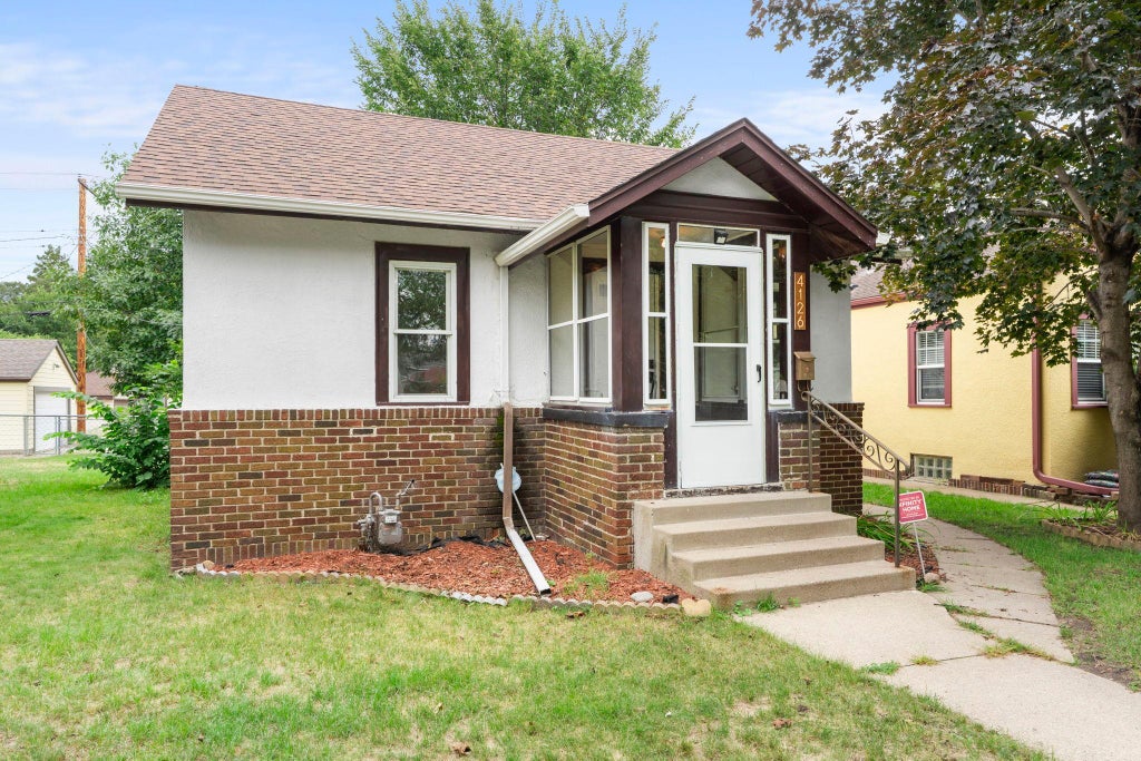 Photo of 4126 Sheridan Avenue N, Minneapolis, MN 55412 (MLS # 7149378)