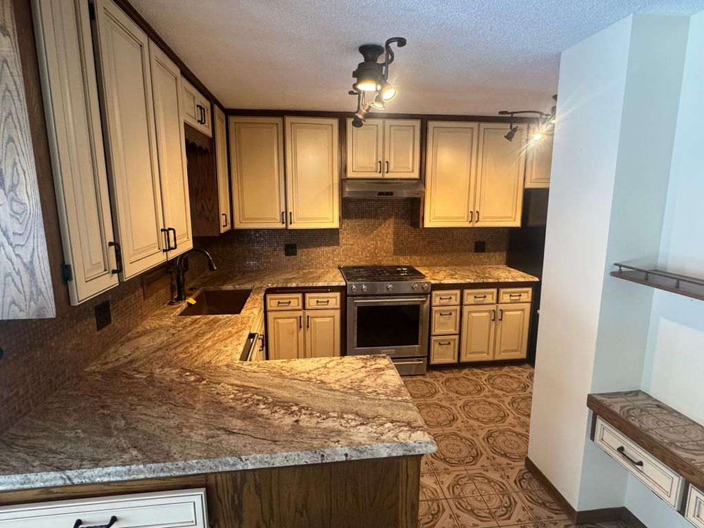 Photo of 5564 E Danube Road, Fridley, MN 55432 (MLS # 6822320)