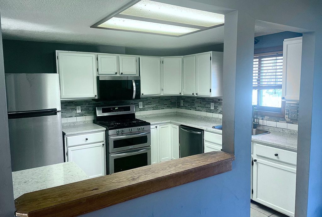 Photo of 5347 Portland Avenue, White Bear Twp, MN 55110 (MLS # 7050078)