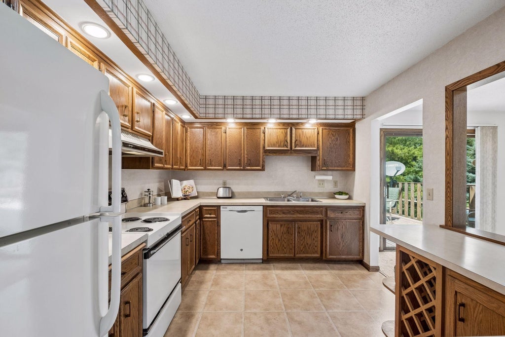 Photo of 5706 W 98 1/2 Street, Bloomington, MN 55437 (MLS # 7024999)