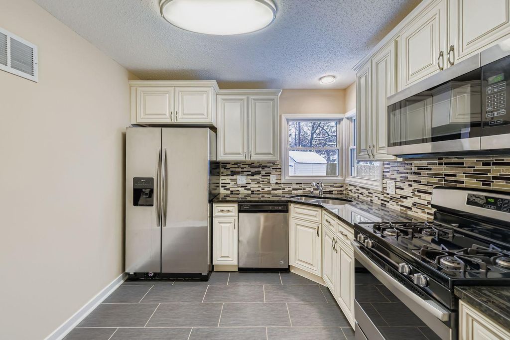 Photo of 2265 Kentucky Lane, Saint Louis Park, MN 55426 (MLS # 6826348)