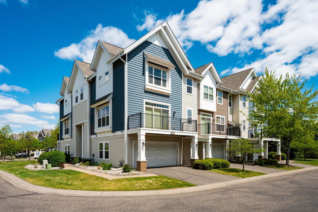 Photo of 11808 Emery Village Drive N, Champlin, MN 55316 (MLS # 7156191)