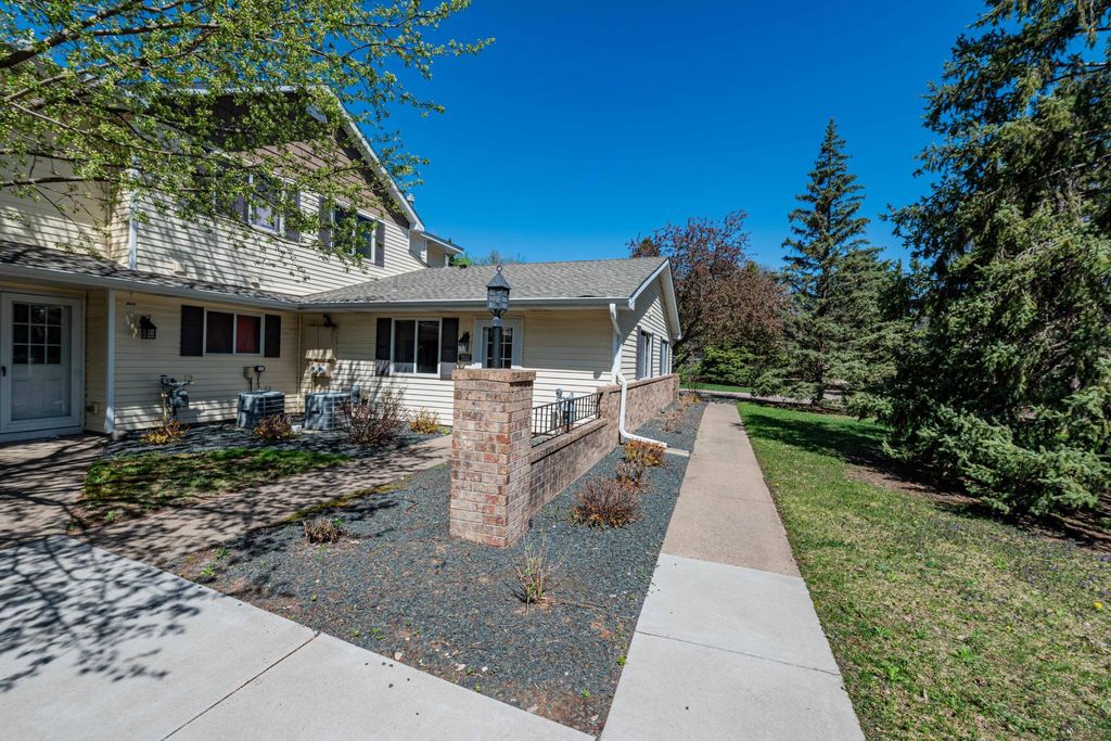 Photo of 7552 15th Street Lane N, Oakdale, MN 55128 (MLS # 7060367)