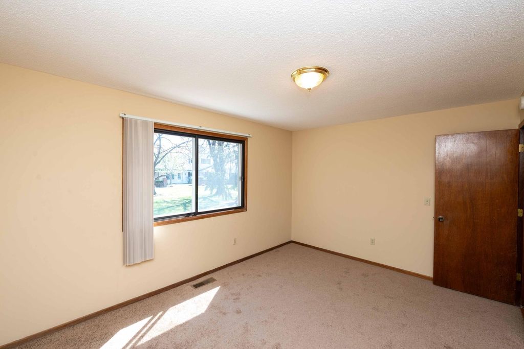 Photo of 7552 15th Street Lane N, Oakdale, MN 55128 (MLS # 7060367)