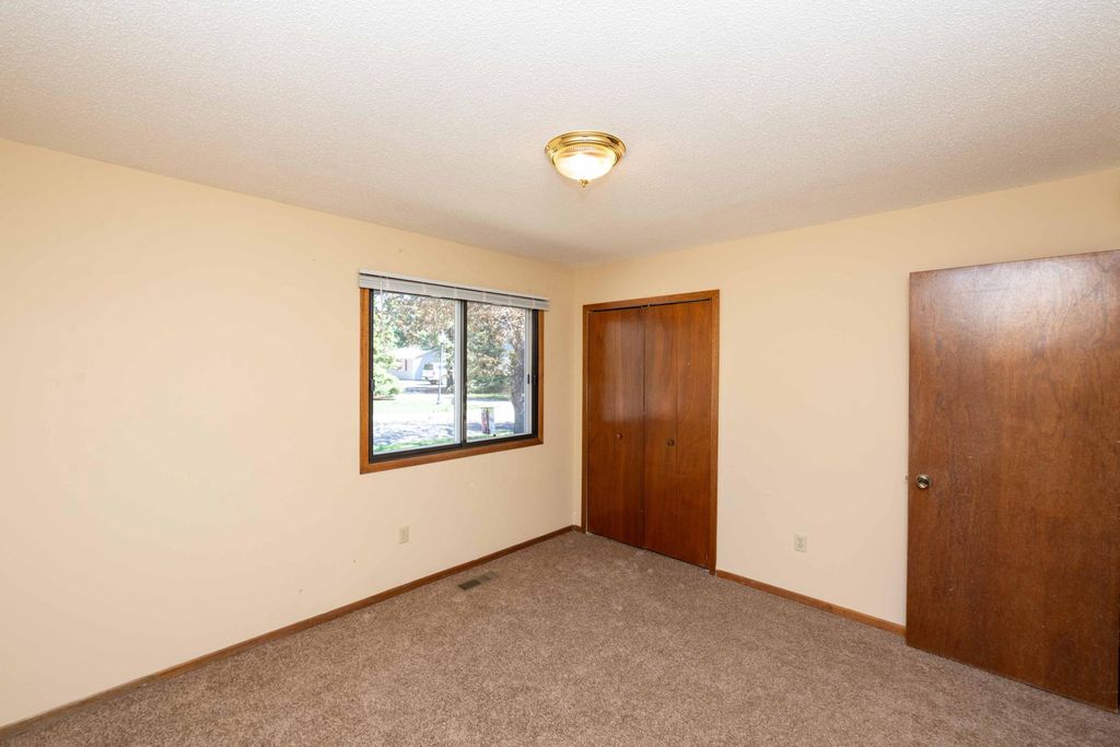 Photo of 7552 15th Street Lane N, Oakdale, MN 55128 (MLS # 7060367)