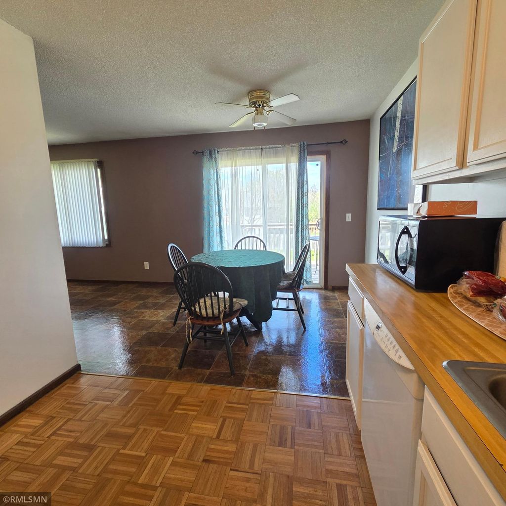 Photo of 8704 Bass Creek Avenue N, Brooklyn Park, MN 55428 (MLS # 7066395)