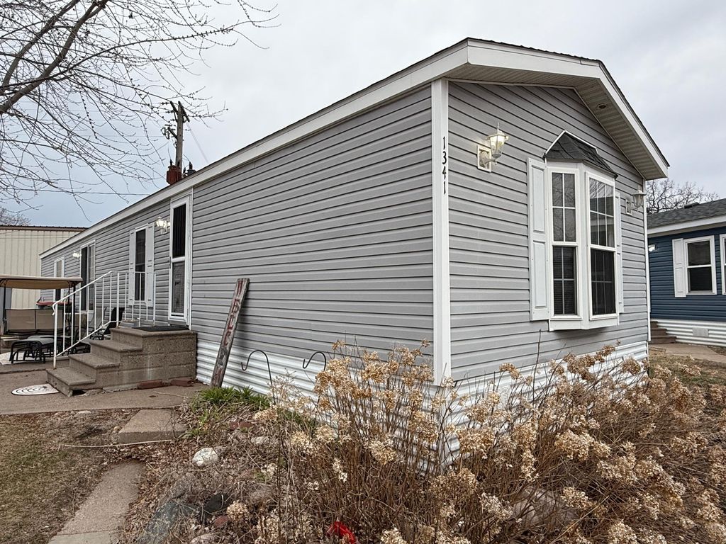 Photo of 1341 104th Lane NE, Blaine, MN 55434 (MLS # 7051088)