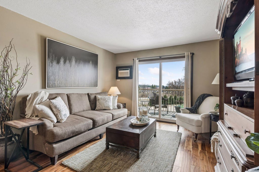 Photo of 3155 Old Highway 8 #306, Roseville, MN 55418 (MLS # 7133047)