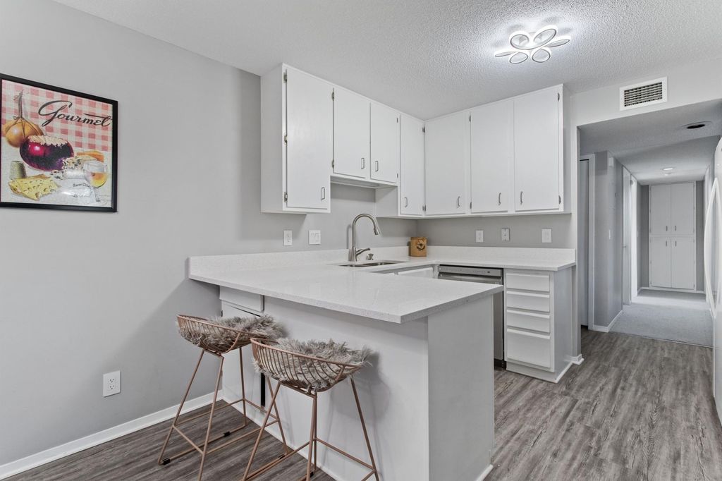 Photo of 2485 Canabury Drive #206, Little Canada, MN 55117 (MLS # 7008454)