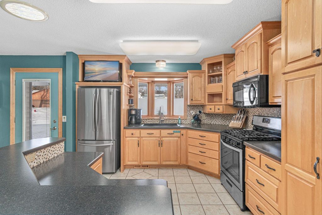 Photo of 7809 119th Avenue N, Champlin, MN 55316 (MLS # 7020008)