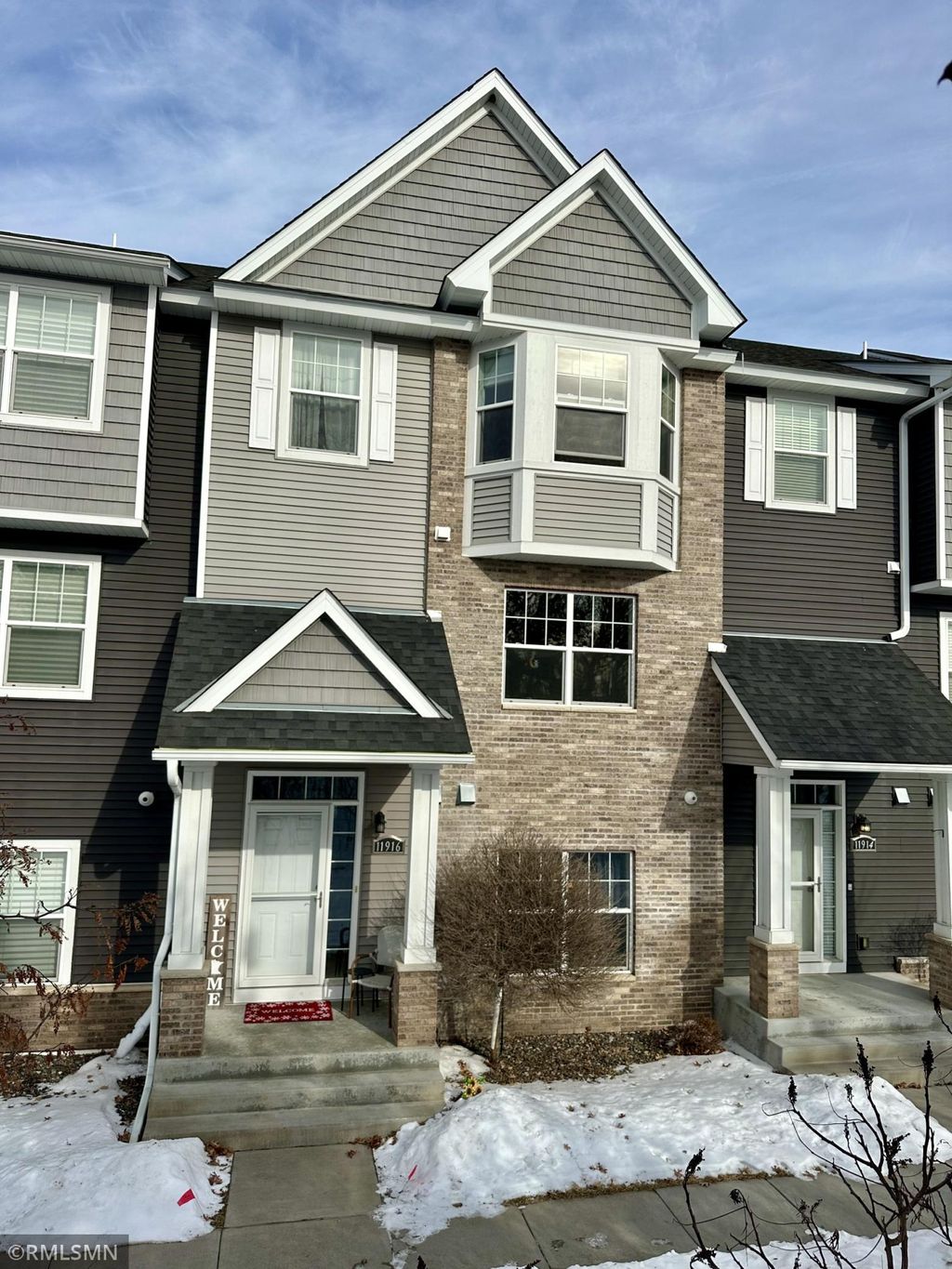 Photo of 11916 Emery Village Drive N, Champlin, MN 55316 (MLS # 7018145)