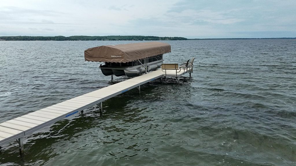 Photo of 14275 Schuelke Beach Road NW, Miltona, MN 56354 (MLS # 6738019)