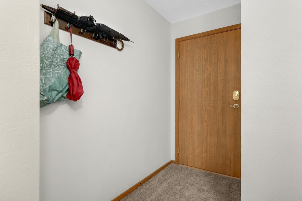 Photo of 925 Bahls Drive #307, Hastings, MN 55033 (MLS # 7152229)