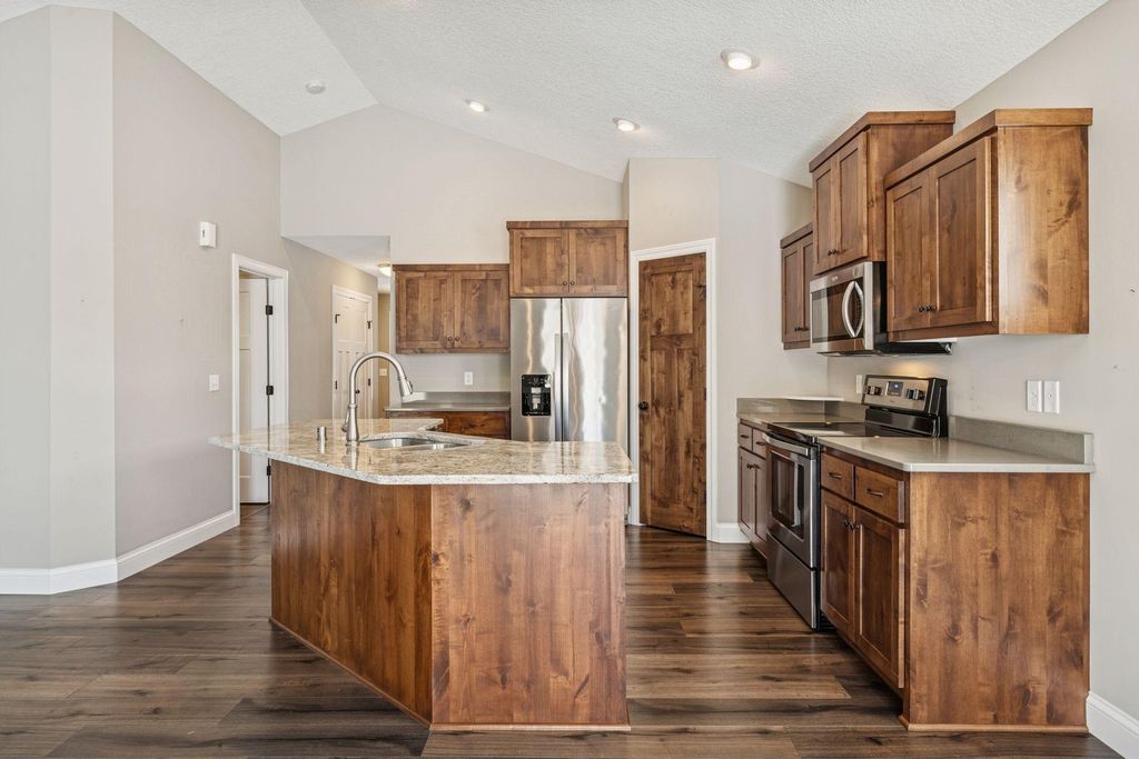 Photo of 10105 Ewing Lane N, Brooklyn Park, MN 55443 (MLS # 7043542)