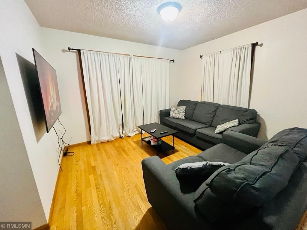 Photo of 1149 5th Street E, Saint Paul, MN 55106 (MLS # 7011600)