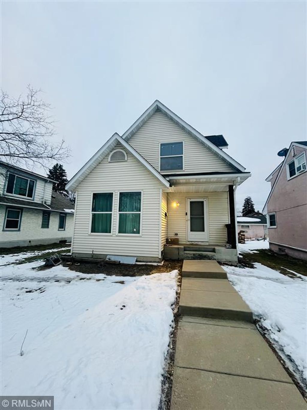 Photo of 1149 5th Street E, Saint Paul, MN 55106 (MLS # 7011600)