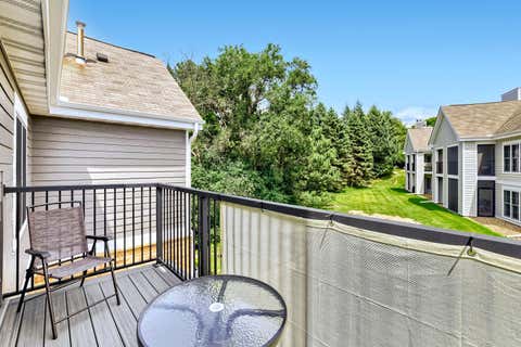 Photo of 6010 Chasewood Parkway #206, Hopkins, MN 55343 (MLS # 7109269)
