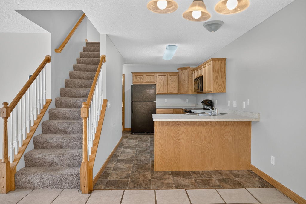 Photo of 3536 Genevieve Avenue N, Oakdale, MN 55128 (MLS # 7161633)