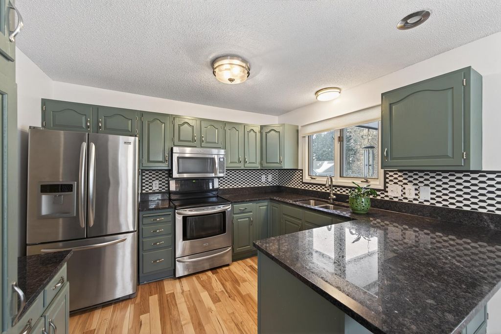 Photo of 3979 Woodview Drive, Vadnais Heights, MN 55127 (MLS # 7007605)