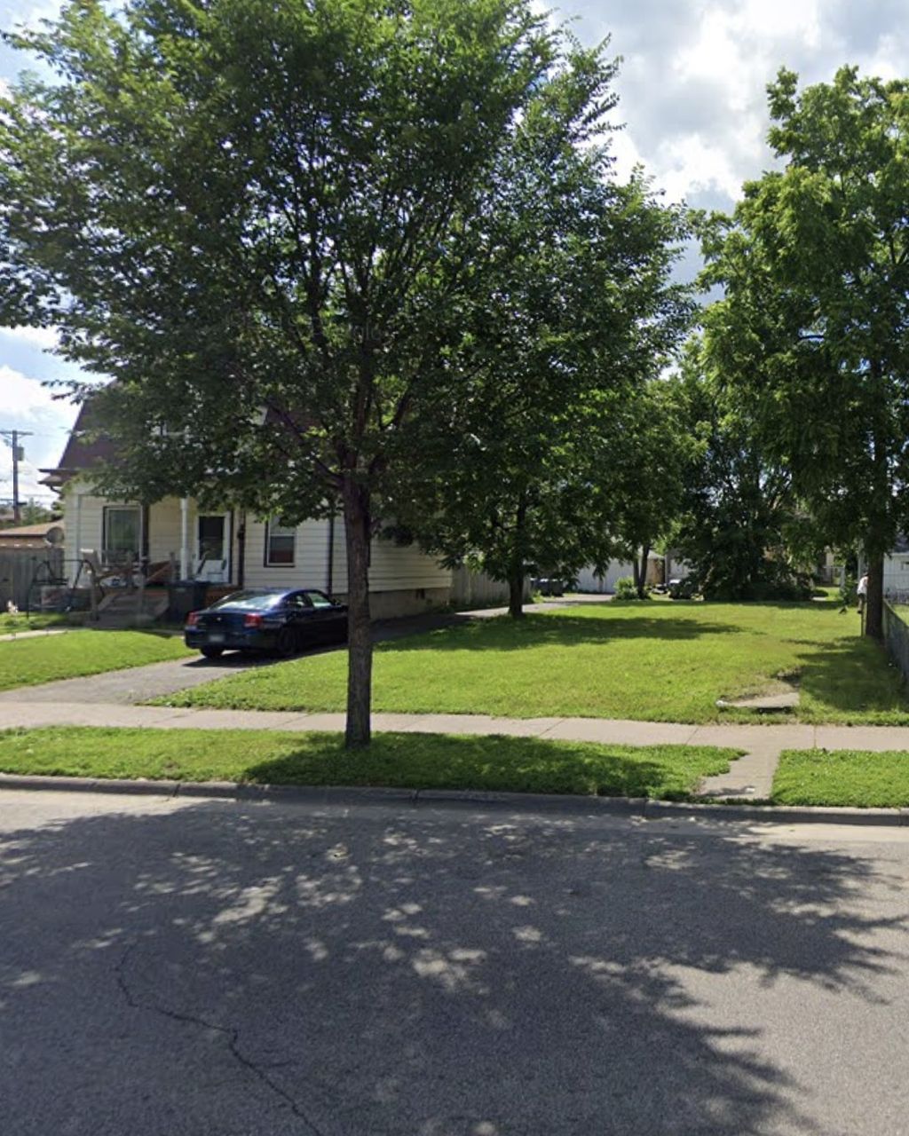 Photo of 4015 Lyndale Avenue N, Minneapolis, MN 55412 (MLS # 7015014)