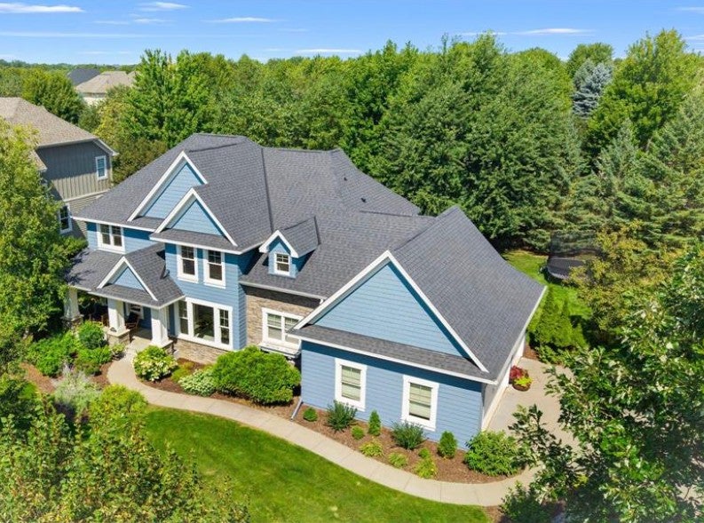 Photo of 10930 Bentwater Lane, Woodbury, MN 55129 (MLS # 7154256)