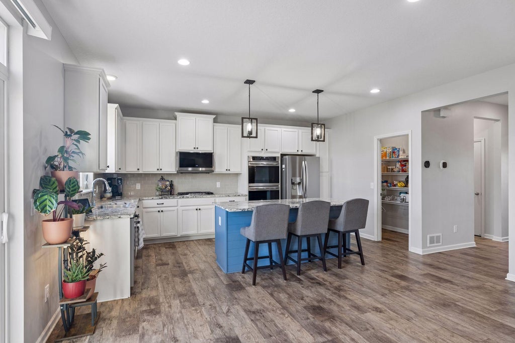Photo of 8668 Platinum Drive, Woodbury, MN 55129 (MLS # 7158555)