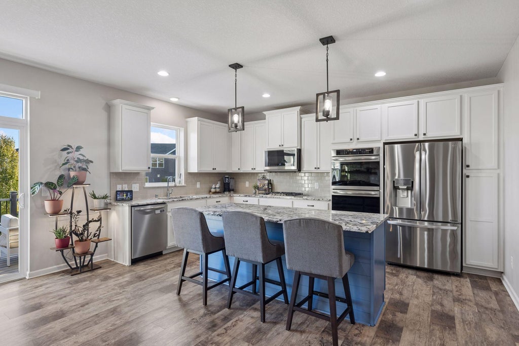 Photo of 8668 Platinum Drive, Woodbury, MN 55129 (MLS # 7158555)