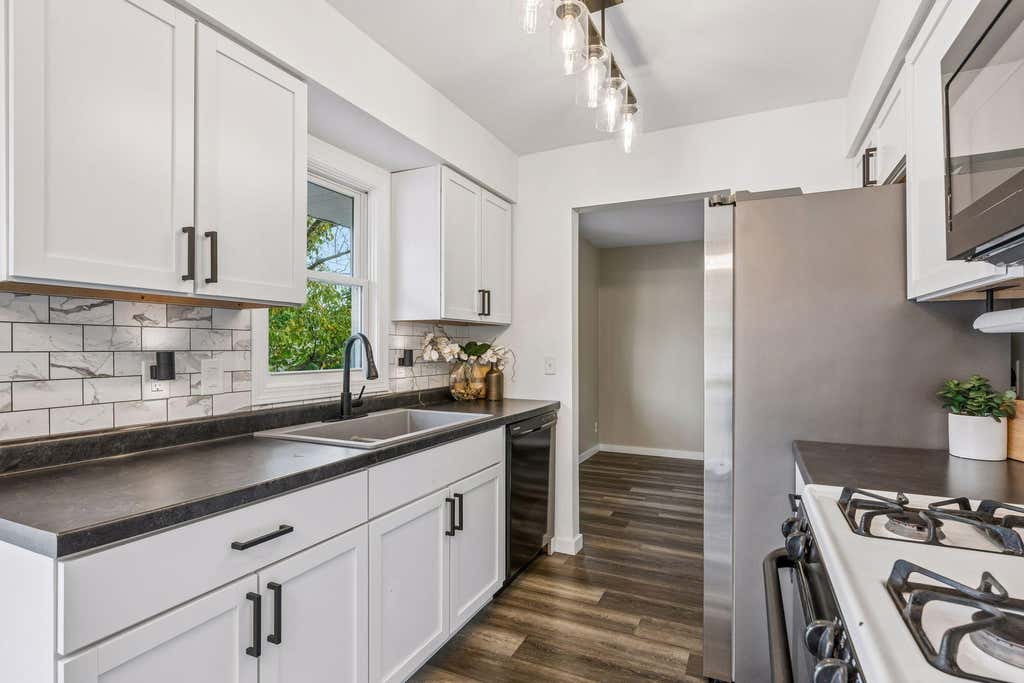 Photo of 311 109th Avenue NW, Coon Rapids, MN 55448 (MLS # 7086426)