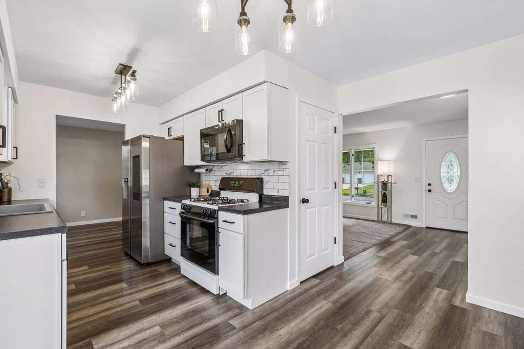 Photo of 311 109th Avenue NW, Coon Rapids, MN 55448 (MLS # 7086426)