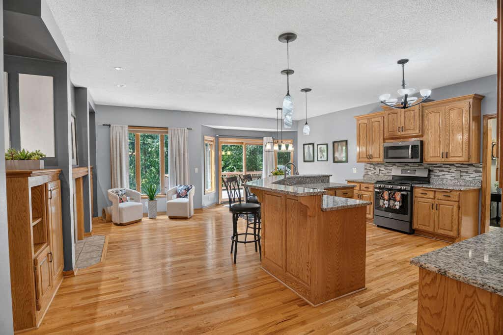 Photo of 11125 Woods Trail N, Champlin, MN 55316 (MLS # 7124360)