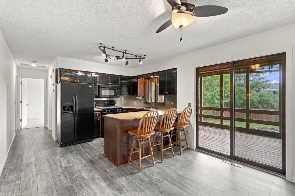 Photo of 7721 112th Avenue N, Champlin, MN 55316 (MLS # 7150267)