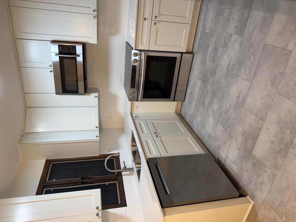 Photo of 1547 20th Avenue NW, New Brighton, MN 55112 (MLS # 7026790)