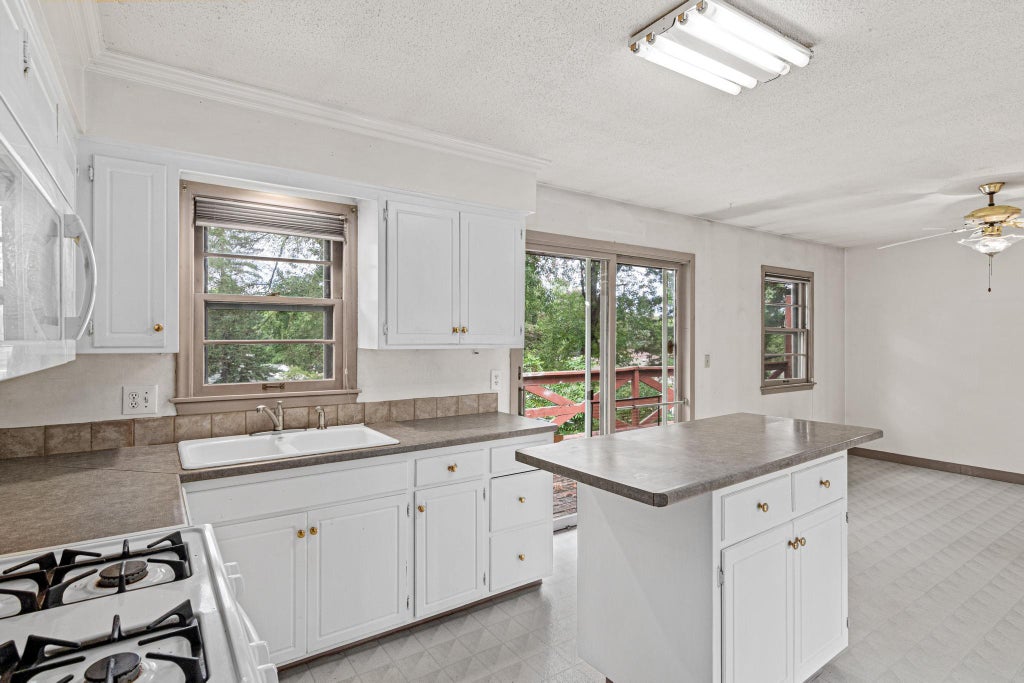 Photo of 1837 City Heights Drive, Maplewood, MN 55117 (MLS # 6800195)