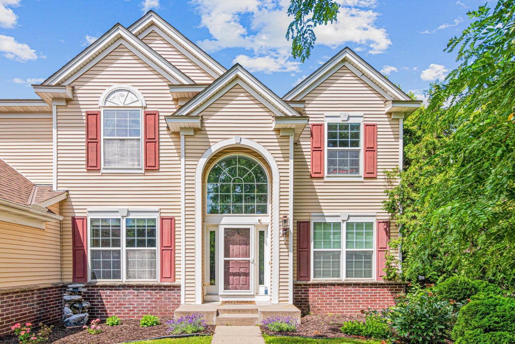Photo of 7128 Timber Crest Drive S, Cottage Grove, MN 55016 (MLS # 7128129)