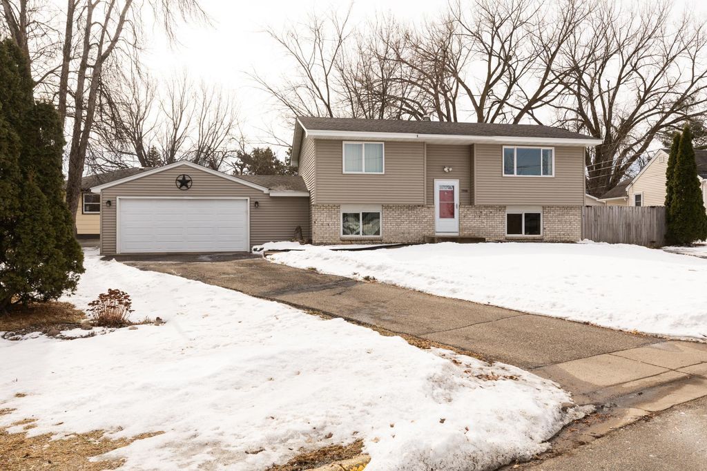 Photo of 7998 E River Road, Fridley, MN 55432 (MLS # 7027143)