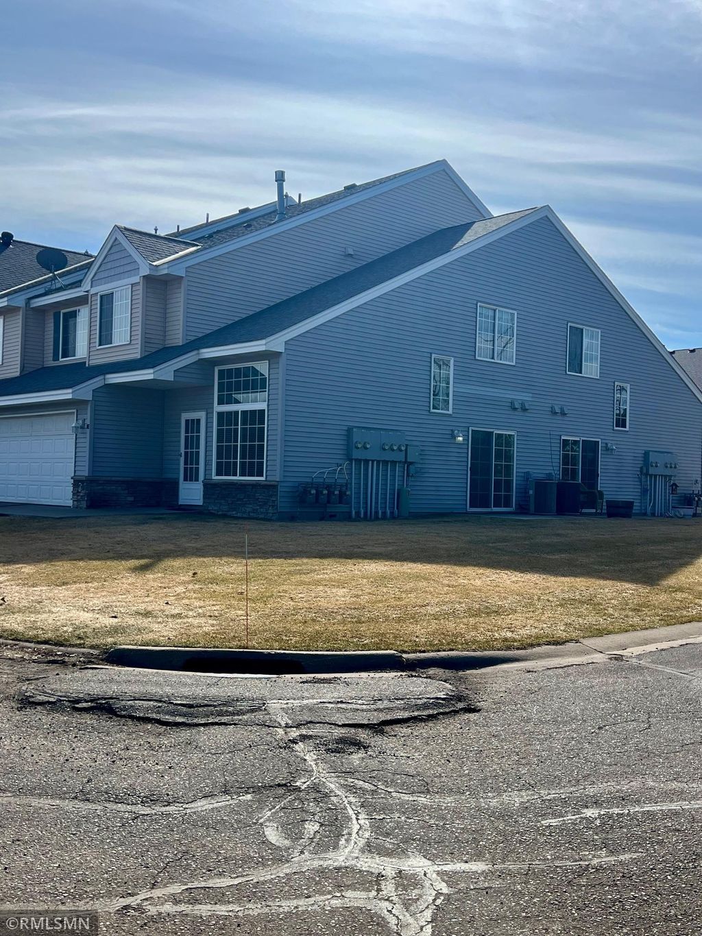 Photo of 301 Roosevelt Street S #E, Cambridge, MN 55008 (MLS # 7041624)