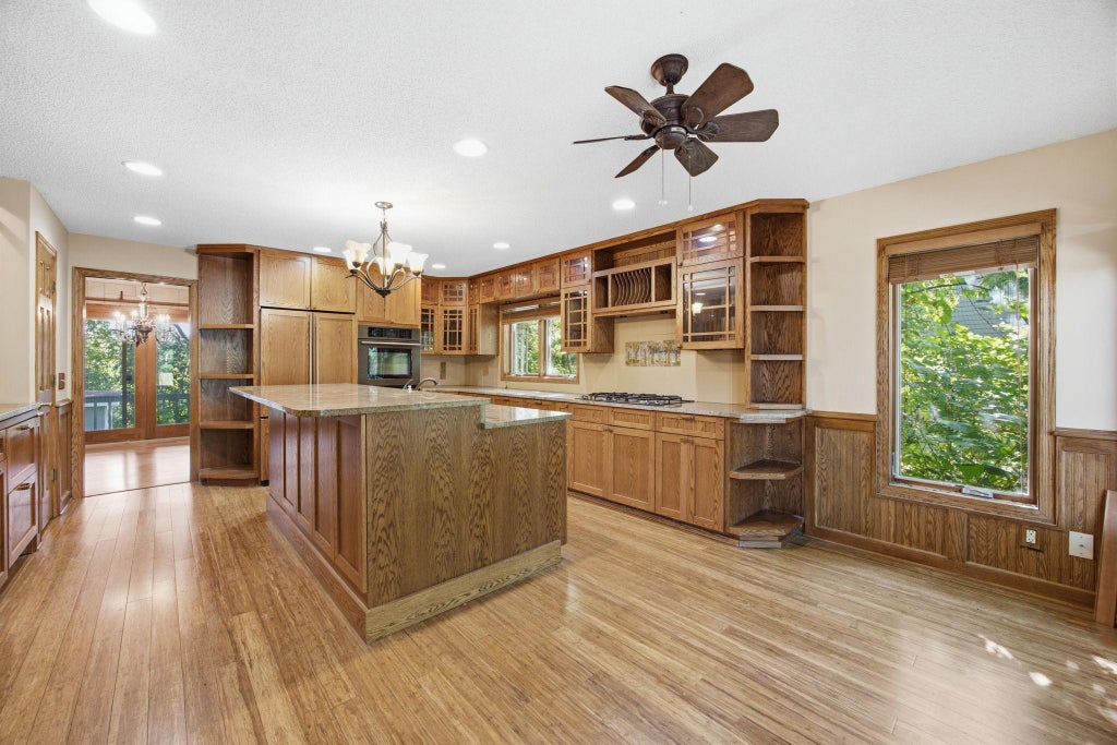 Photo of 8031 Tierneys Woods Curve, Bloomington, MN 55438 (MLS # 7005035)