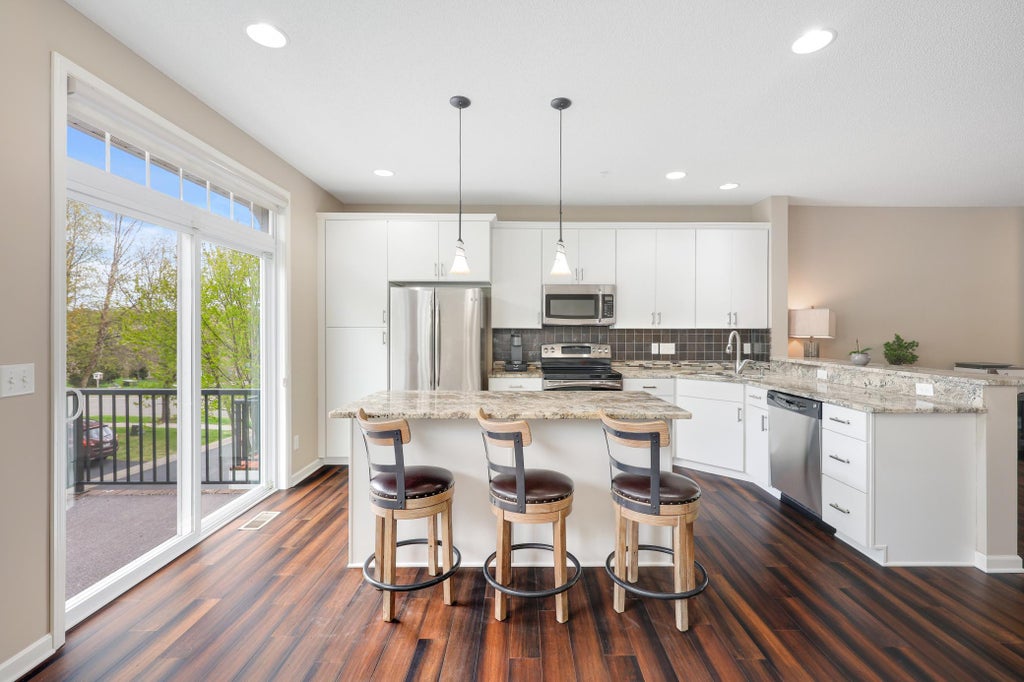 Photo of 11330 Sandcastle Drive #C, Woodbury, MN 55129 (MLS # 7119154)