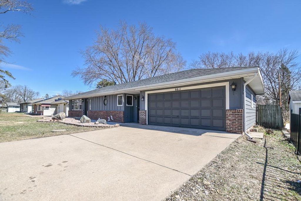 Photo of 6611 Mckinley Street NE, Fridley, MN 55432 (MLS # 7047999)