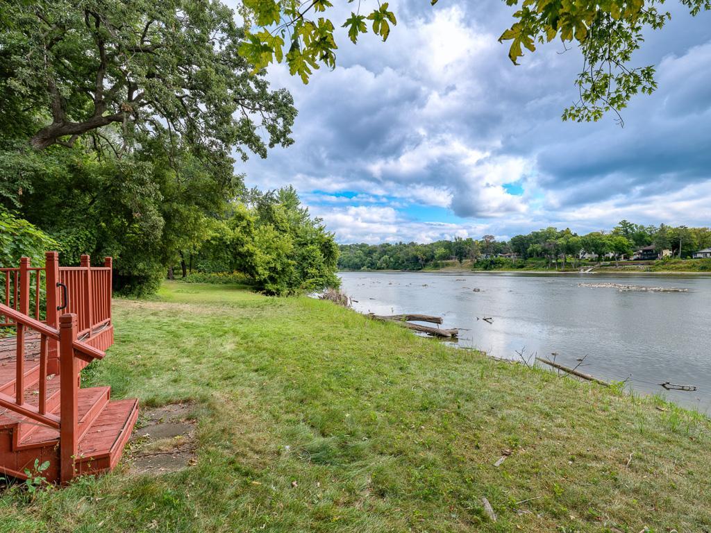 Photo of 9316 W River Road, Brooklyn Park, MN 55444 (MLS # 7134758)