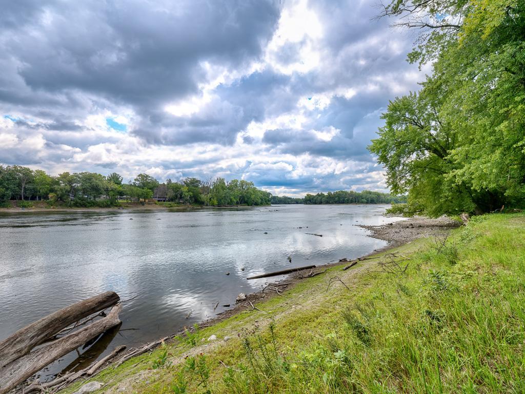 Photo of 9316 W River Road, Brooklyn Park, MN 55444 (MLS # 7134758)