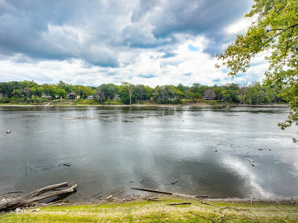 Photo of 9316 W River Road, Brooklyn Park, MN 55444 (MLS # 7134758)