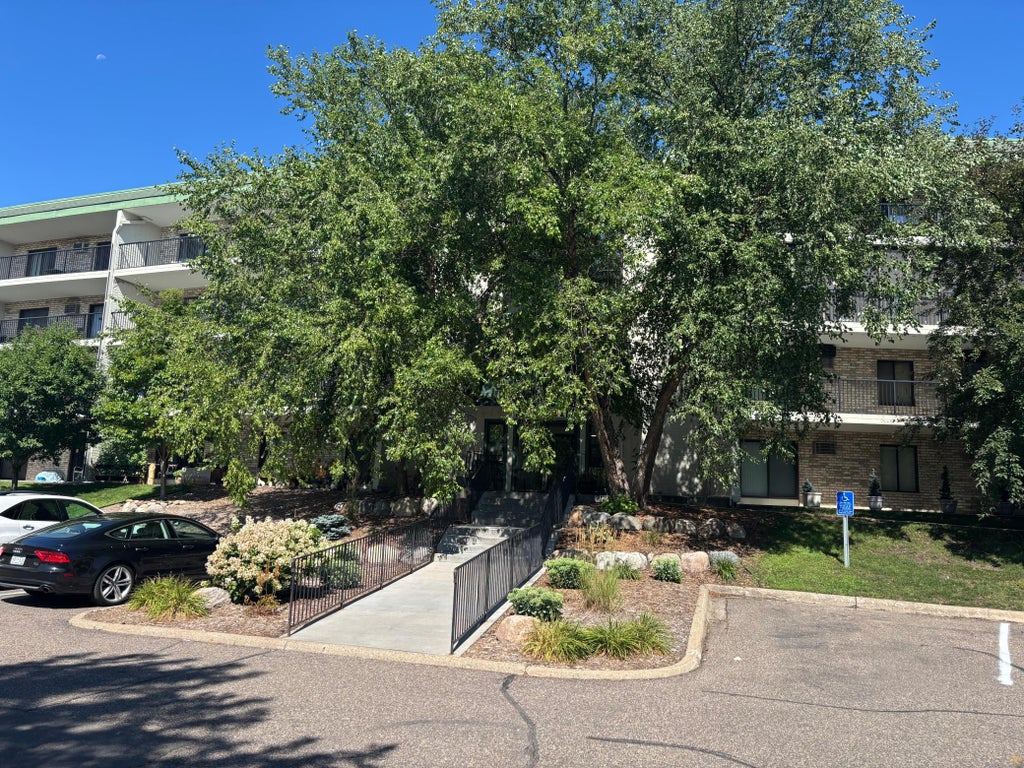 Photo of 10521 Cedar Lake Road #411, Minnetonka, MN 55305 (MLS # 7124073)