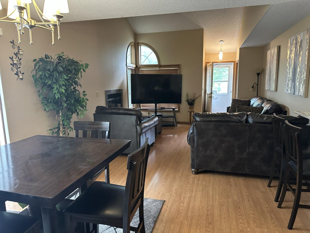 Photo of 1122 Pecks Woods Drive, New Brighton, MN 55112 (MLS # 7144373)