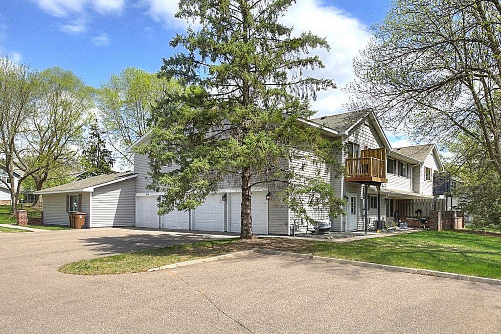 Photo of 7638 13th Street N, Oakdale, MN 55128 (MLS # 7096315)