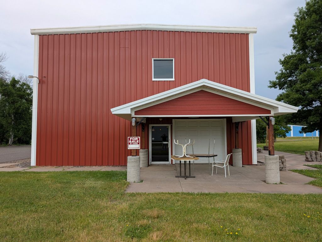 Photo of 520 S Blanding Woods Road, Saint Croix Falls, WI 54024 (MLS # 7091965)
