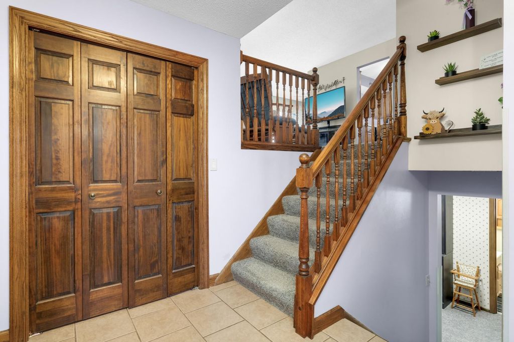 Photo of 12061 Ilex Street NW, Coon Rapids, MN 55448 (MLS # 7057359)